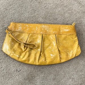 Maurizio Taituti leather clutch